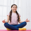 A Child learning Yoga